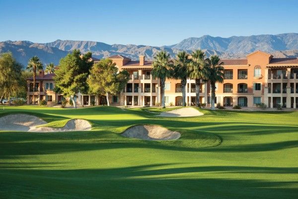 Marriott's Shadow Ridge Luxurious golf resort with condo-style villas, lush green fairways, palm trees, and mountain backdrop at Marriott's Shadow Ridge.