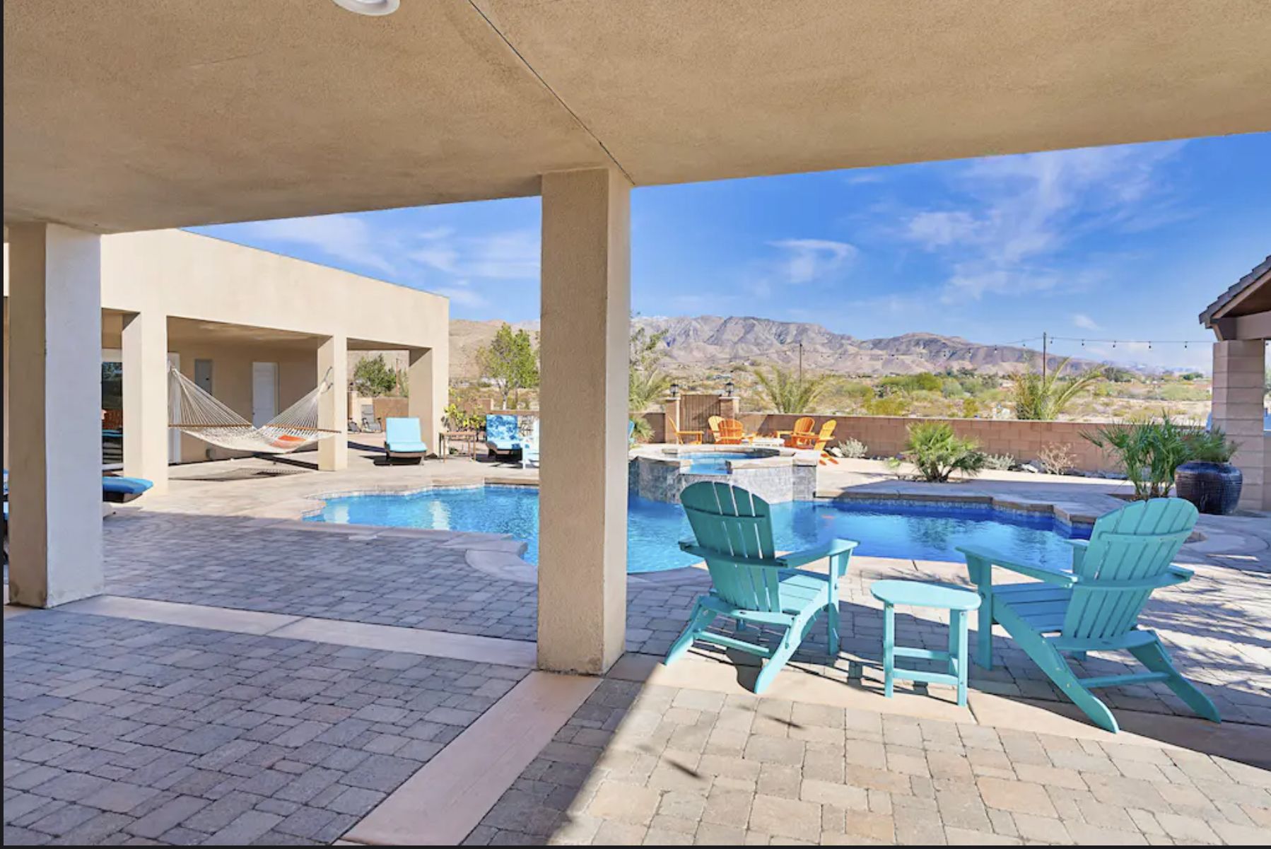 Hotwell Painted Hills - Desert Hot Springs, CA Luxury desert retreat in Desert Hot Springs, CA with saltwater pool, spa, outdoor kitchen, 5 bedrooms, and scenic mountain views.