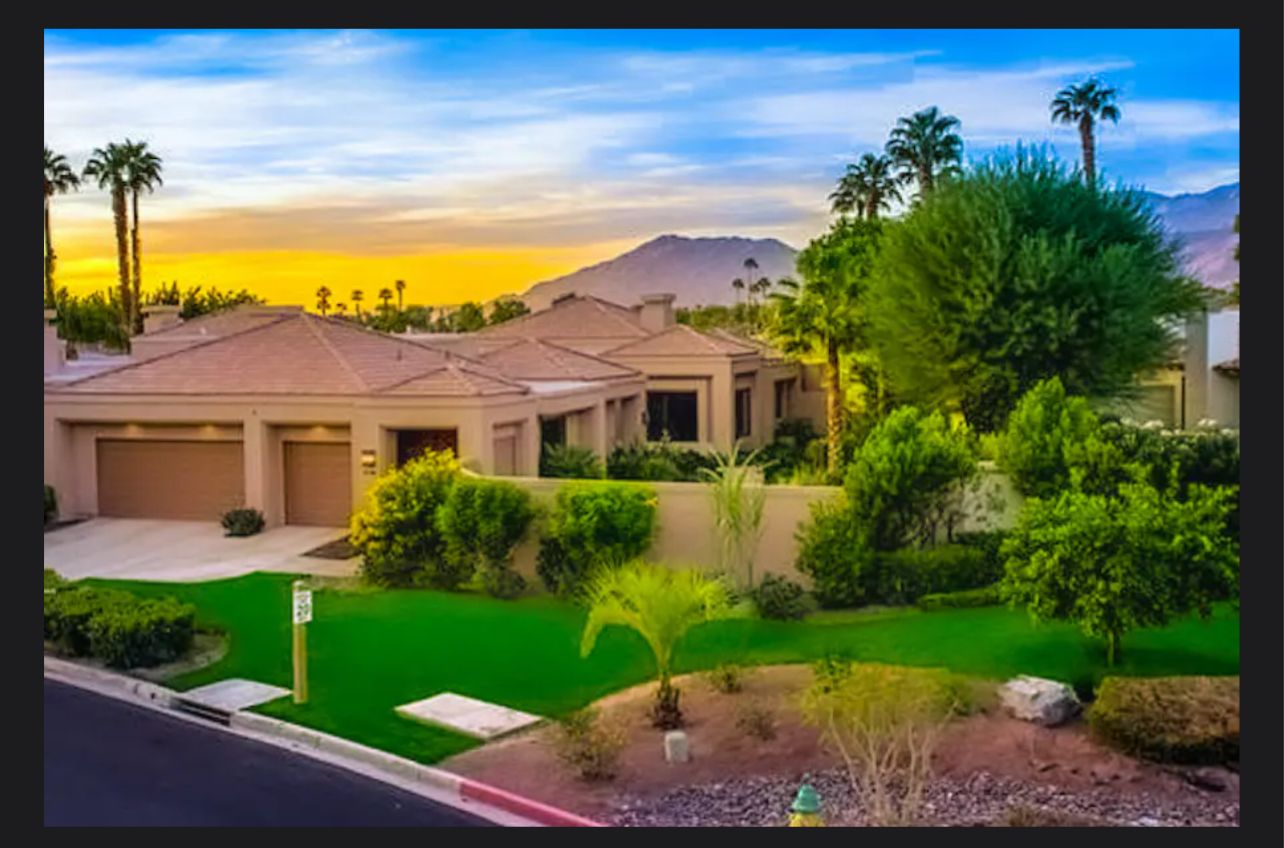 Escape to Luxury at PGA West - La Quinta, CA Luxury vacation rental at PGA West in La Quinta, California, overlooking the Arnold Palmer Course with lush greenery and mountain views.