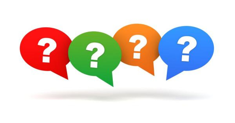 Colorful speech bubbles with question marks, illustrating inquiries about golf packagers and their benefits for golf vacations.