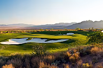 Scenic view of Boulder Creek Golf Club's 18-hole championship golf course with lush green fairways, sand traps, and water hazards.