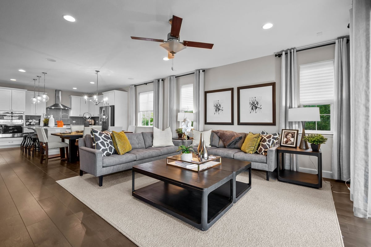 Luxurious Buffalo Run 6-bedroom house interior with modern decor, bright living room, and serene golf course views.